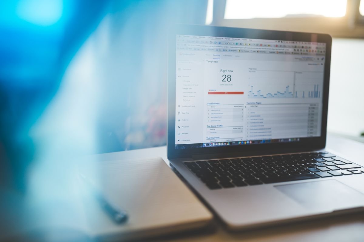 Analytics dashboard open on a laptop showing traffic data